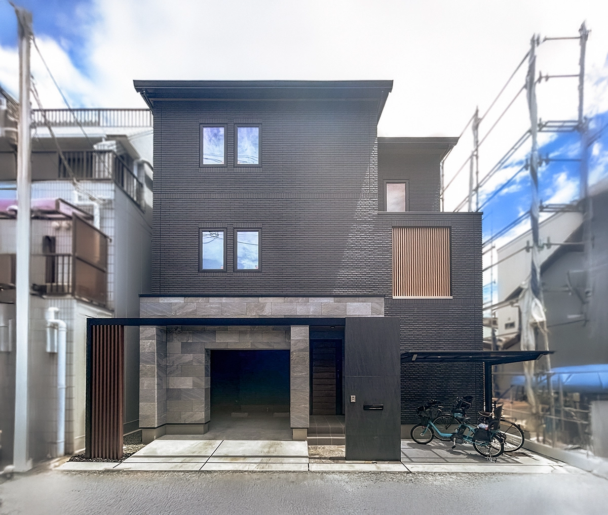 モダンなモノトーンカラーでまとめられた、Gフレームが映えるモノトーン外構　大阪府大阪市